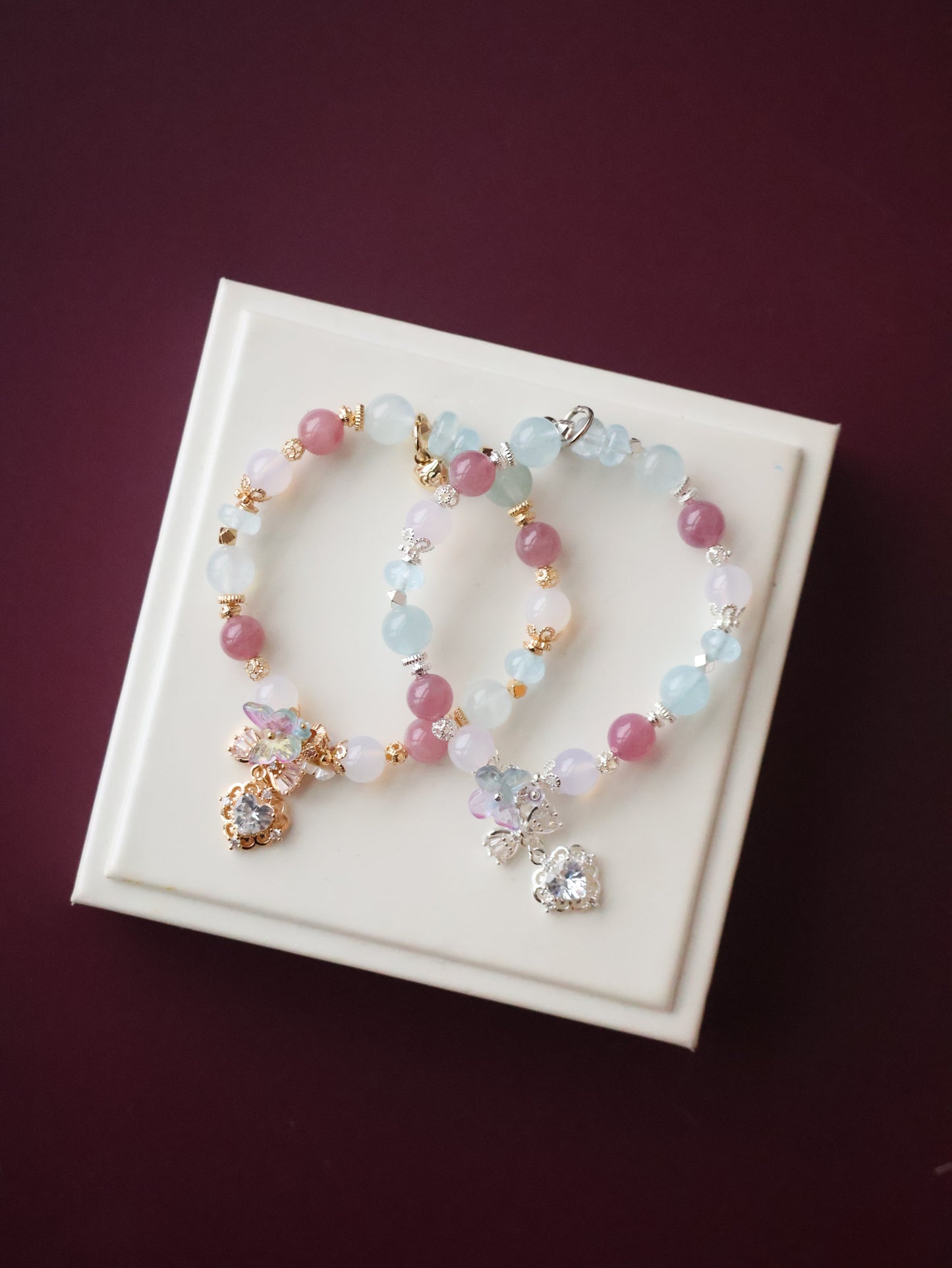 *Instocks* - Blossara - 8mm Blue Topaz, Aquamarine, Lilac Chalcedony & Lavender Rose Quartz with Dangly Sparkly Heart and Butterfly Rainbow Charm (Elastic)
