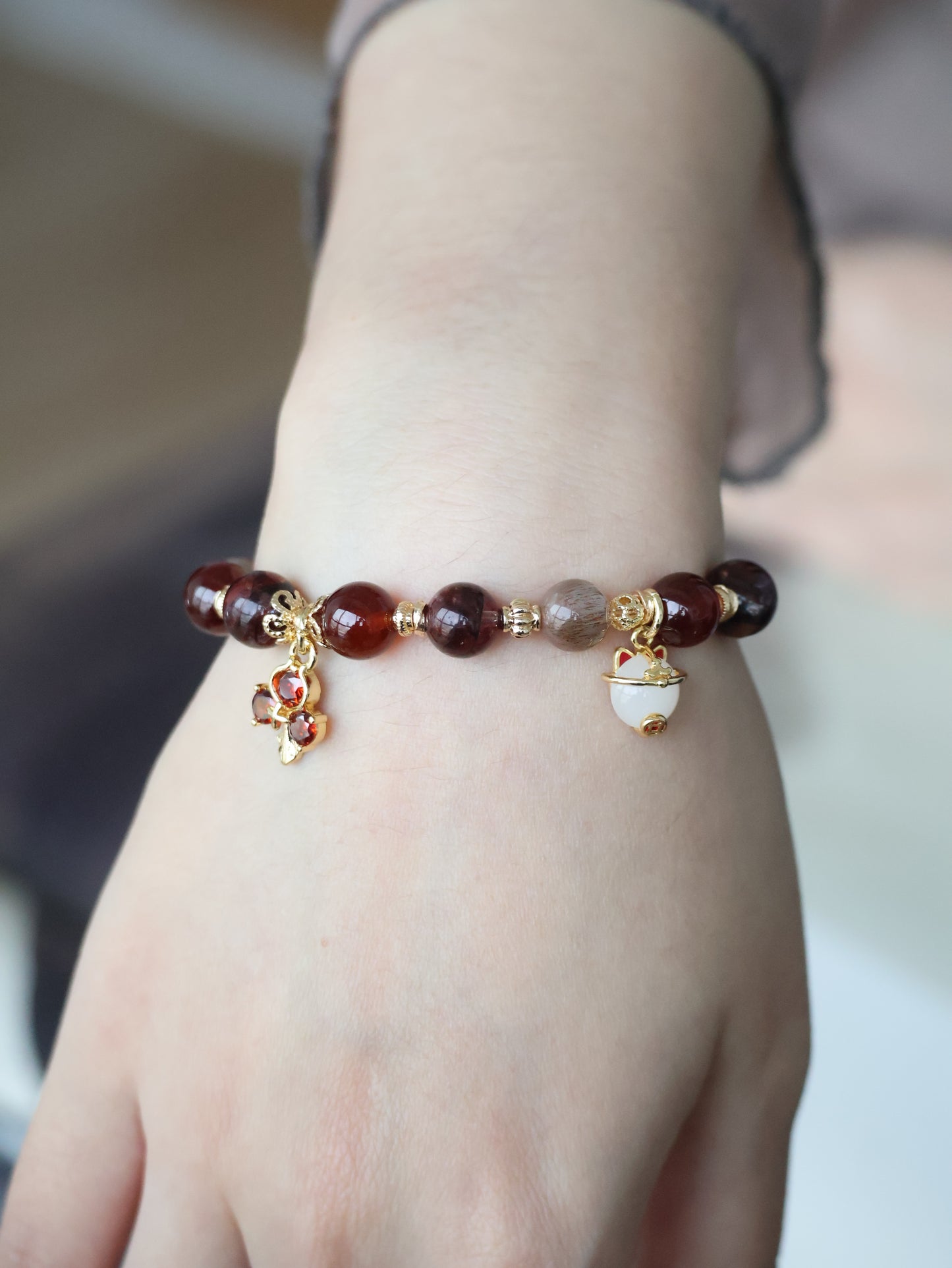 Fire Quartz, Garnet & Black Gold Skeletal Sunstone with Lucky Cat, Red Clover & Fu Charm — Crimson Blessing | 8mm (Elastic, OT Clasp)