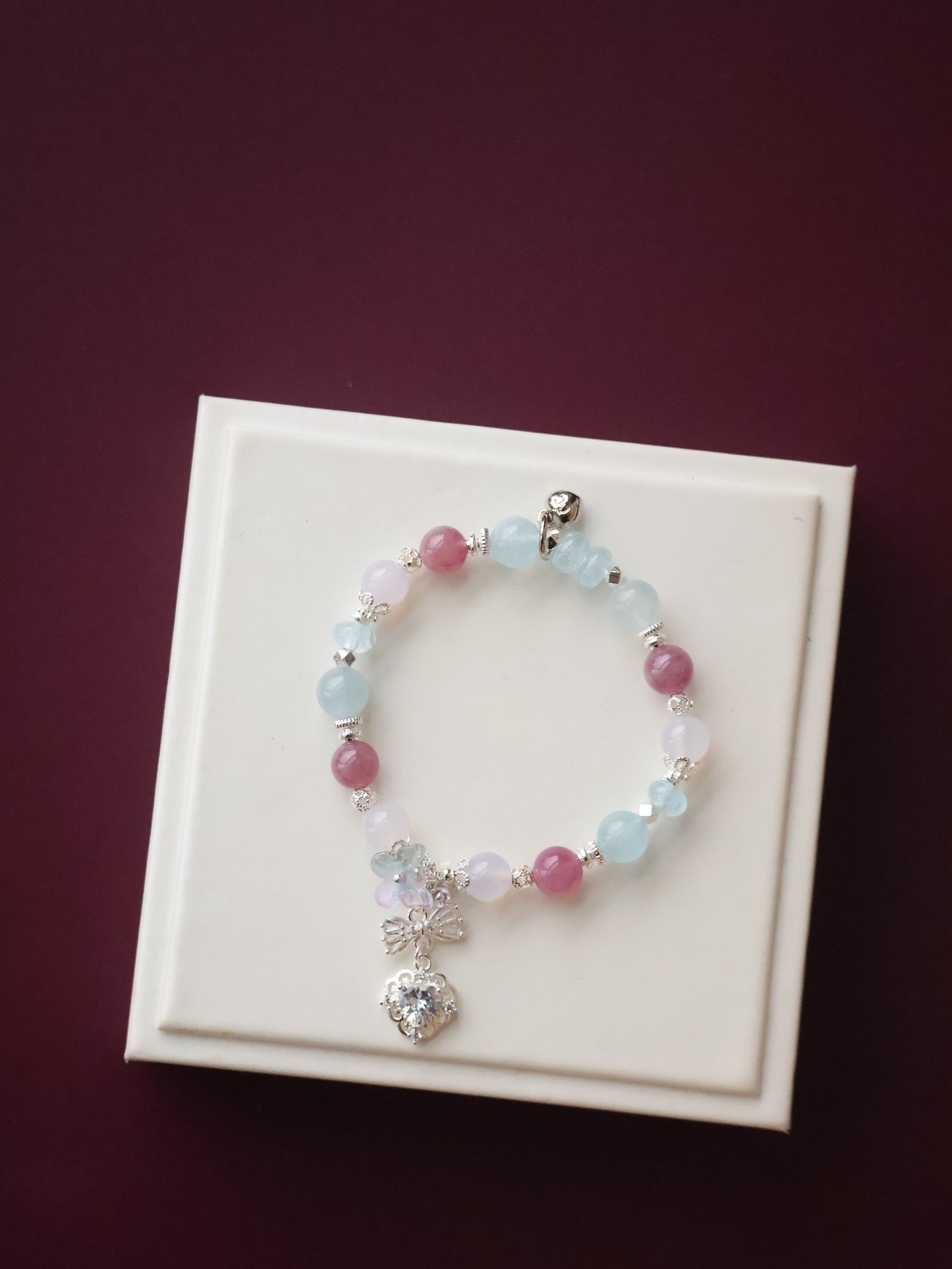 *Instocks*  -  Blossara - 8mm Blue Topaz, Aquamarine, Lilac Chalcedony & Lavender Rose Quartz with Dangly Sparkly Heart and Butterfly Rainbow Charm (Elastic)